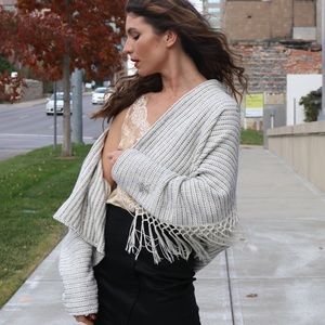 Lucia’s Sarto White and navy fringe sweater jacket with silver rhinestone stars